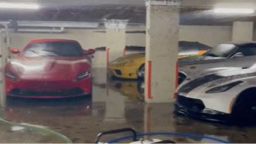 Parkeergarage vol exclusieve auto's ondergelopen tijdens overstroming